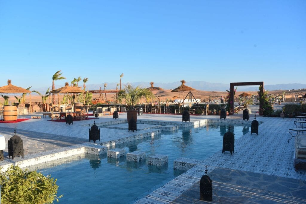 Pool and dunes view in Agafay Desert