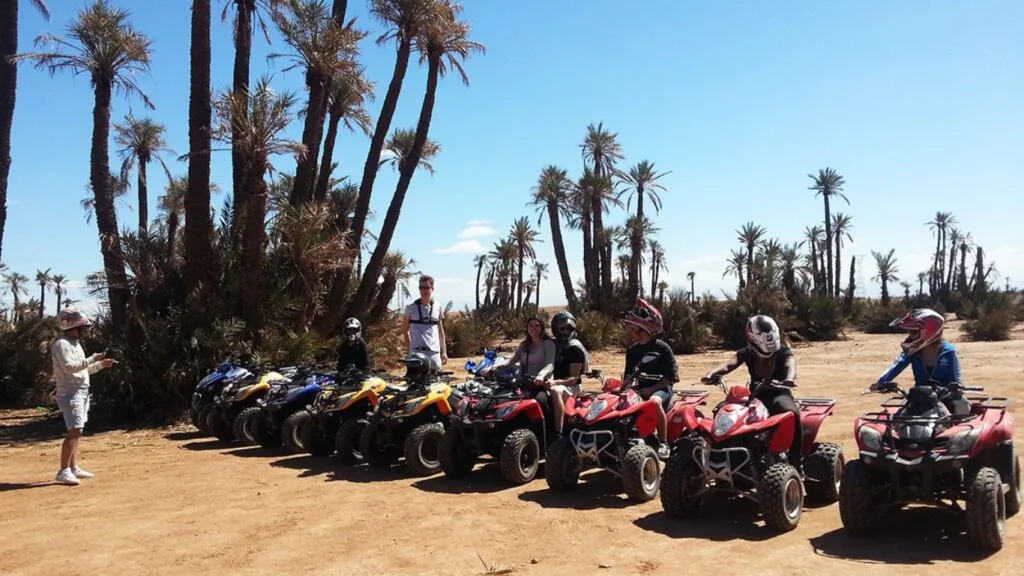 Explore the thrill of riding quads in Marrakech Palmeraie, navigating desert trails, sandy dunes, and scenic palm groves on a guided quad biking adventure.