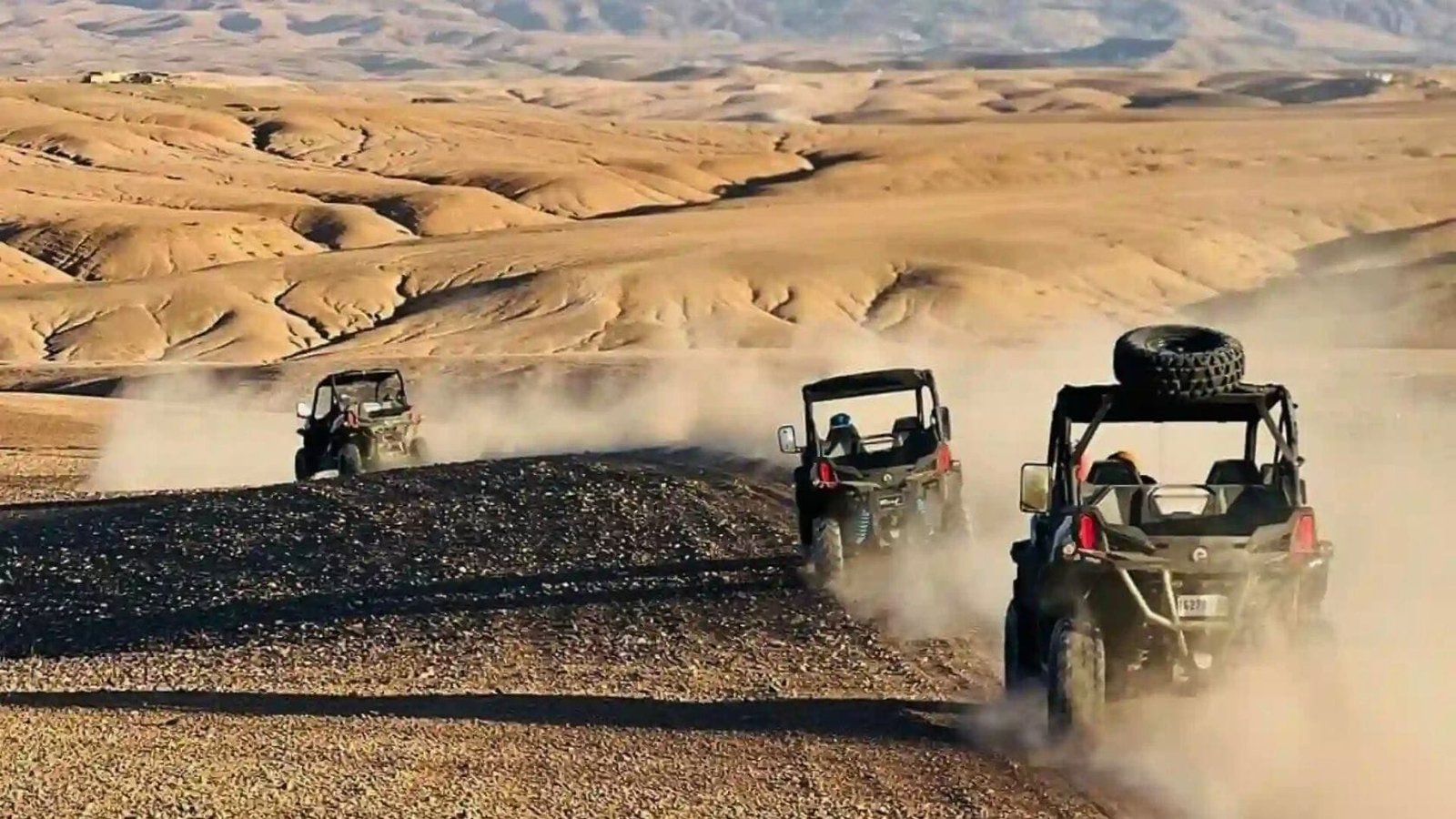Buggy adventure driving through the Agafay Desert rocky trails near Marrakech.